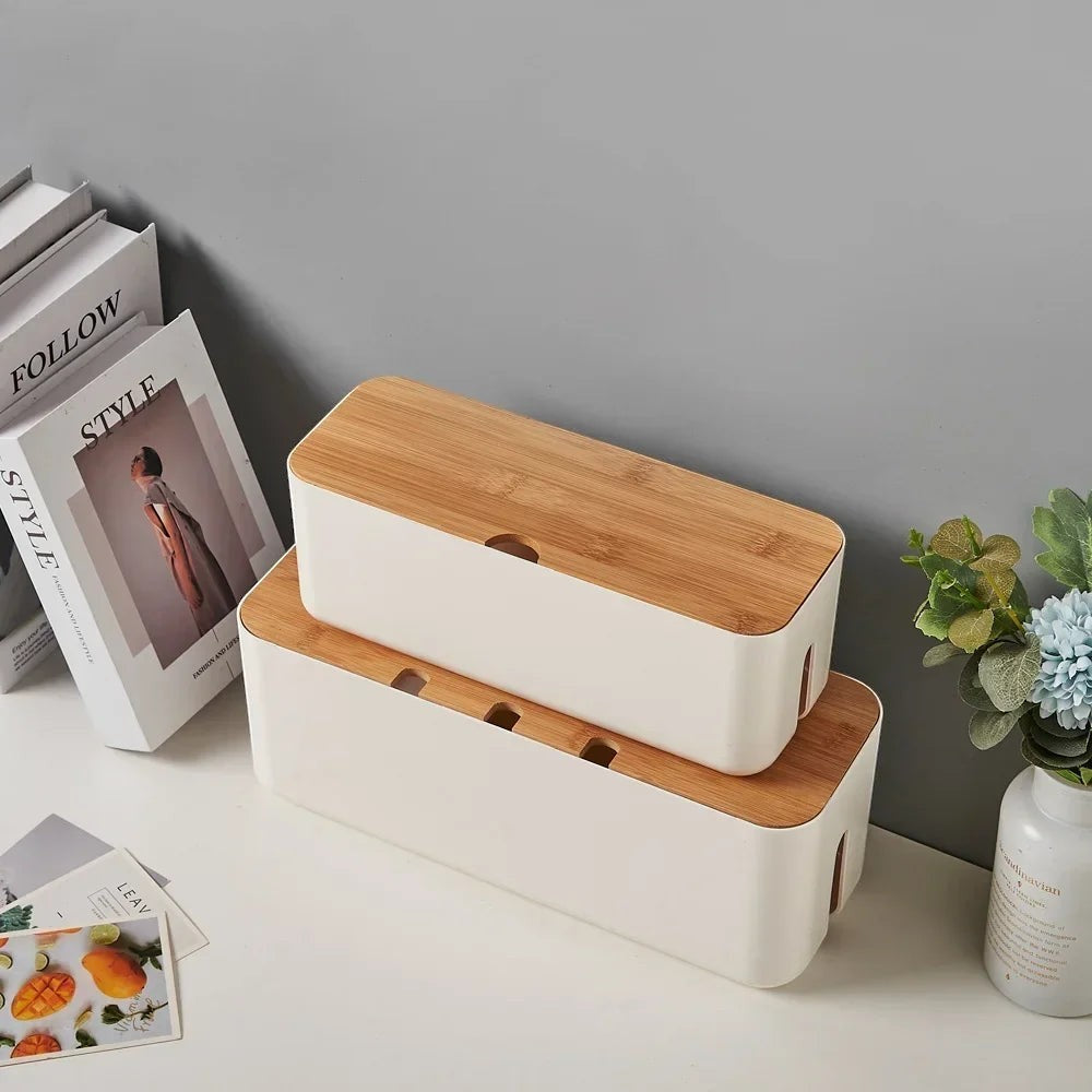 Doctor Desk bamboo cable management boxes with white bodies and wooden lids for hiding power strips on a desk