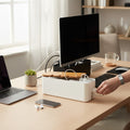 Doctor Desk bamboo and white cable management box hiding power strips and cords on a modern office desk