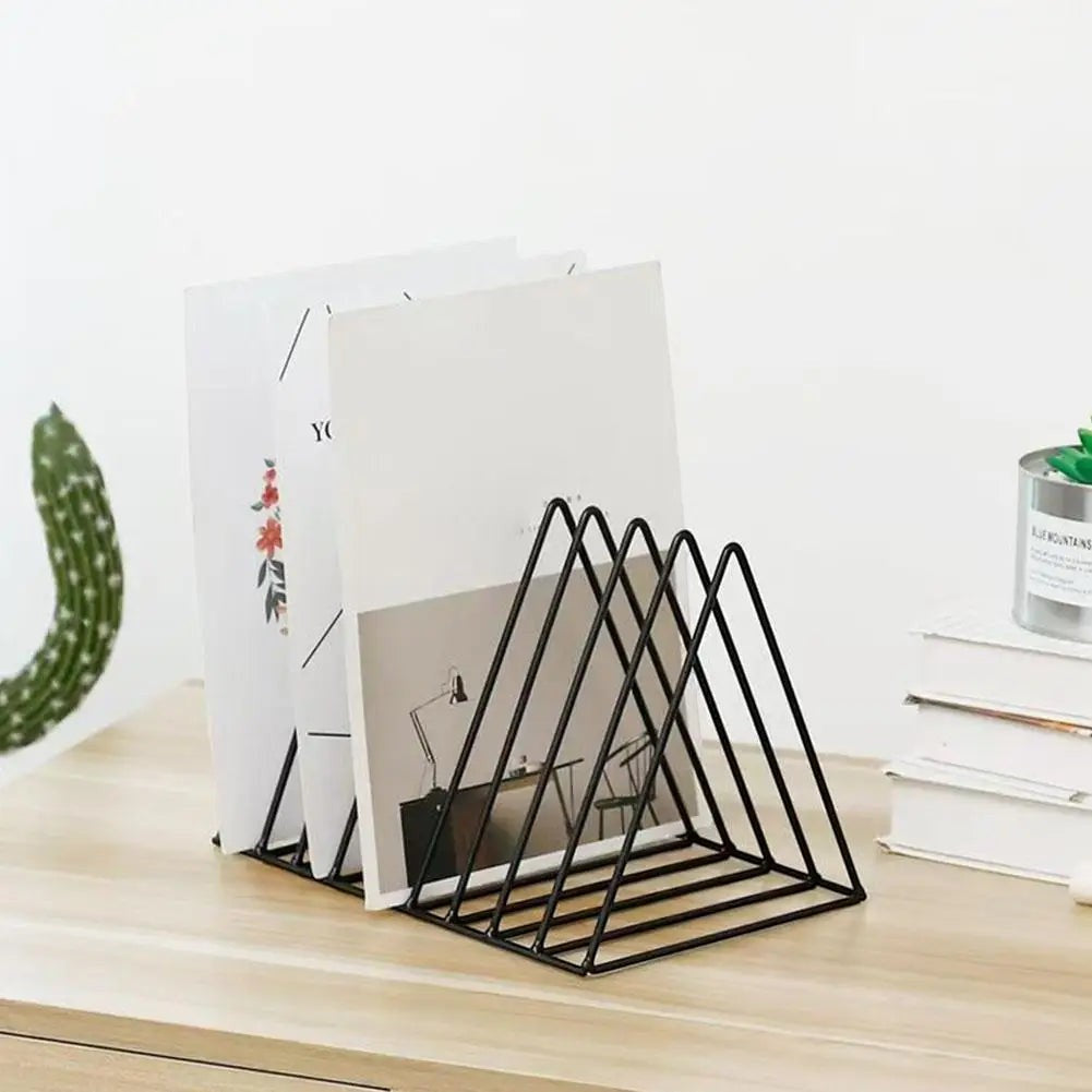 Doctor Desk minimal black metal 5-slot vertical document and book rack on a wooden desk surface.