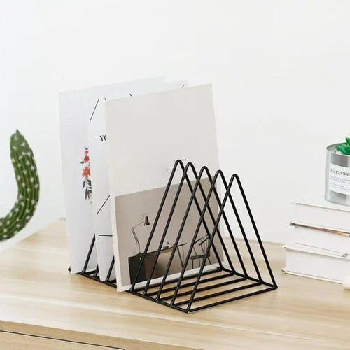 Doctor Desk minimal black metal 5-slot vertical document and book rack on a wooden desk surface.