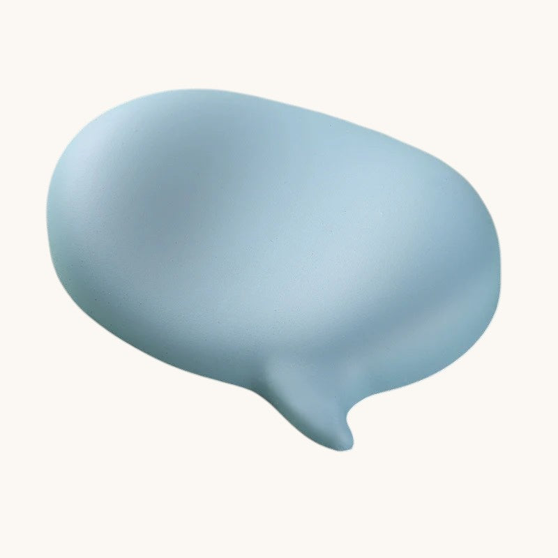 Doctor Desk blue silicone ergonomic bubble mouse wrist rest with a smooth, non-slip surface for desk comfort.