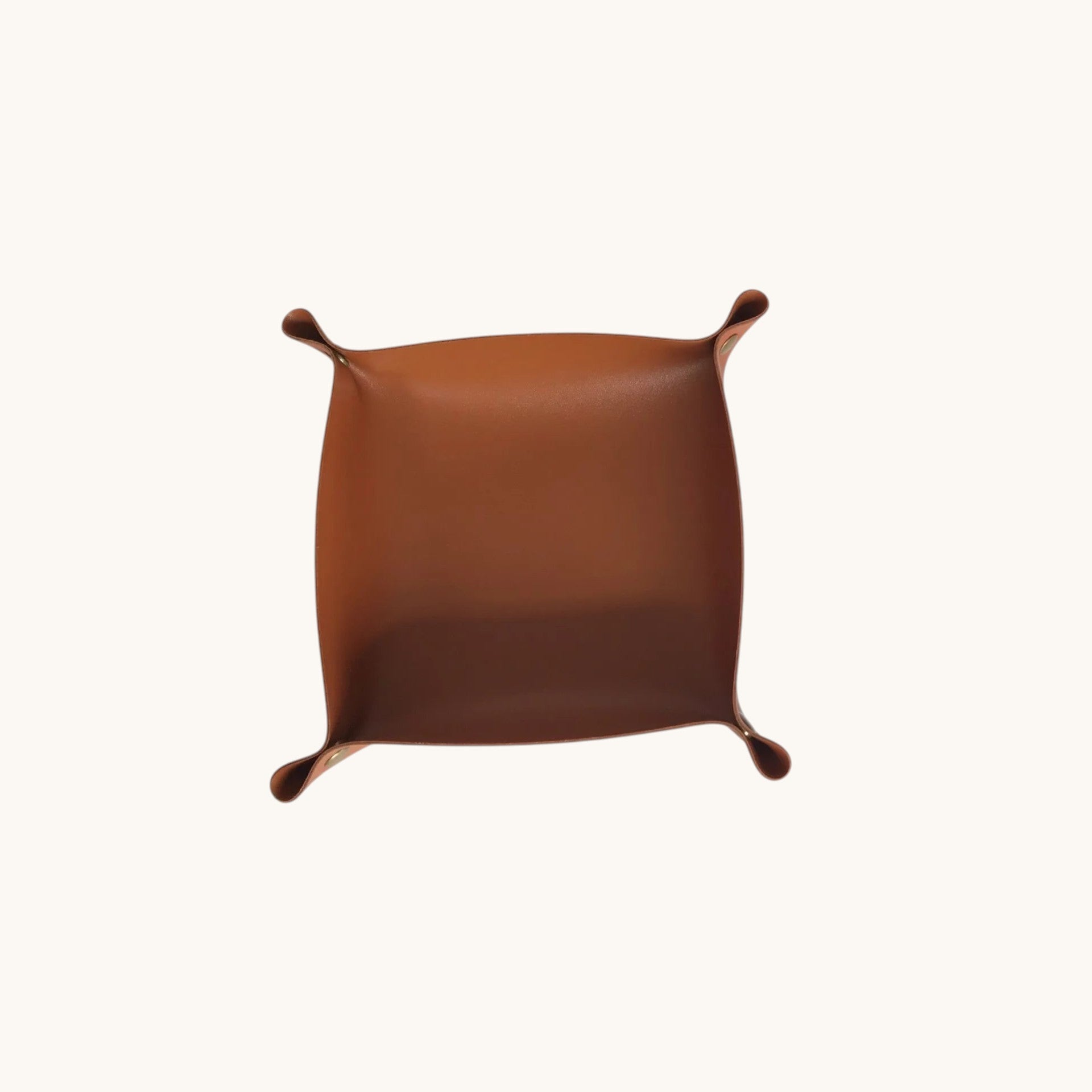 Doctor Desk brown PU leather foldable valet tray for organizing keys, coins, and jewelry on a desktop