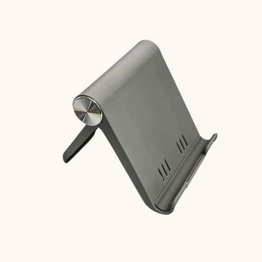 Doctor Desk grey foldable phone stand with adjustable viewing angle and anti-slip base on a white background