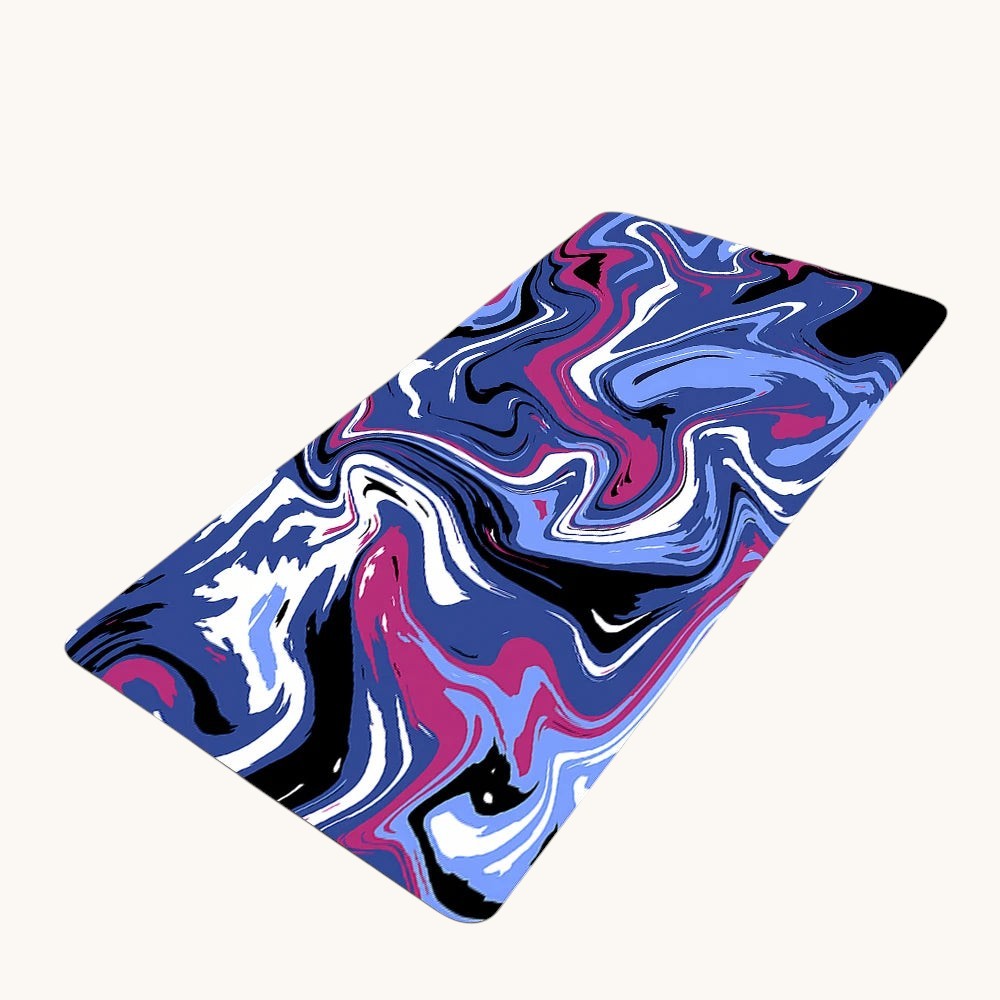 Doctor Desk XXL desk mat featuring a blue, pink, and black liquid swirl pattern with durable stitched edges.
