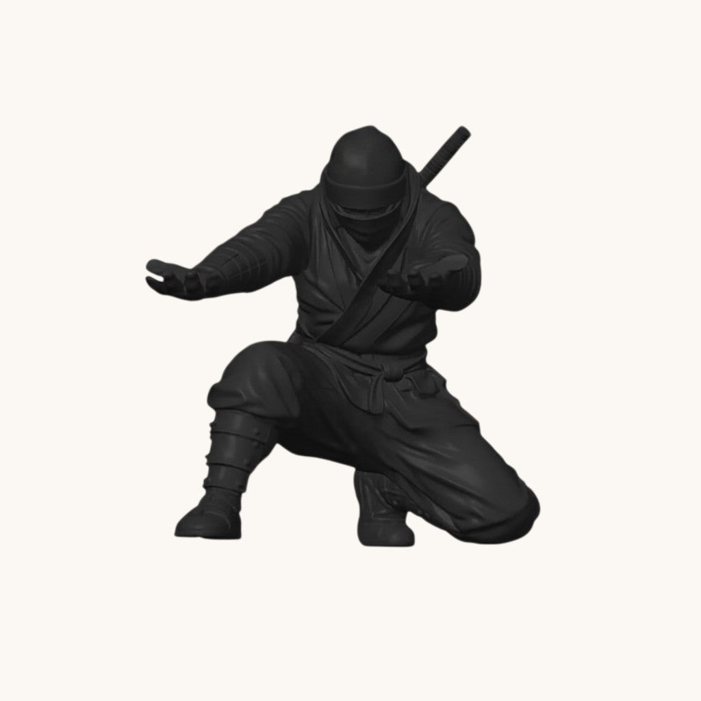 Doctor Desk 3D printed black ninja figurine pen holder in a dynamic kneeling pose for desk organization.