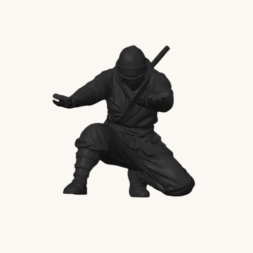 Doctor Desk 3D printed black ninja figurine pen holder in a dynamic kneeling pose for desk organization.