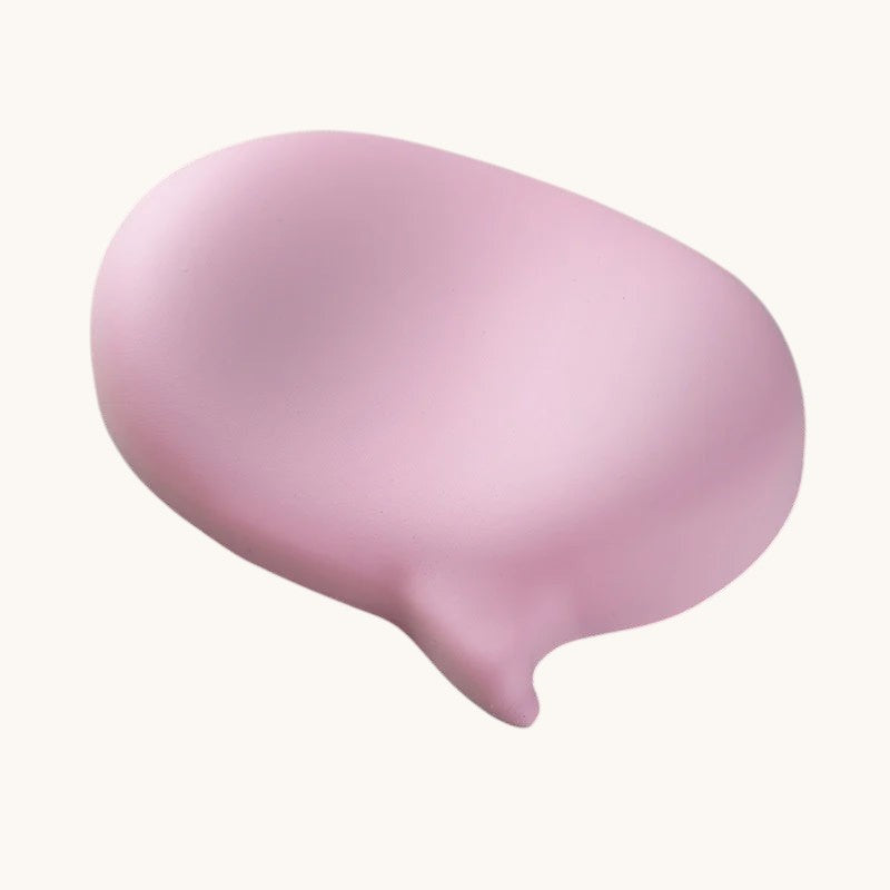 Doctor Desk pink silicone ergonomic bubble mouse wrist rest with a smooth, non-slip surface for comfortable desk use.