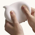Doctor Desk ergonomic silicone mouse wrist rest being squeezed to show soft, flexible bubble shape