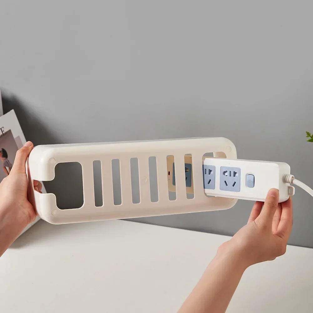 Doctor Desk white ventilated cable management box holding a power strip for organized desk cable storage