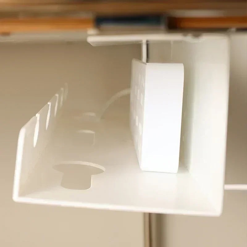 Doctor Desk white metal under desk cable tray with clamp mount holding a power strip for organized cable management
